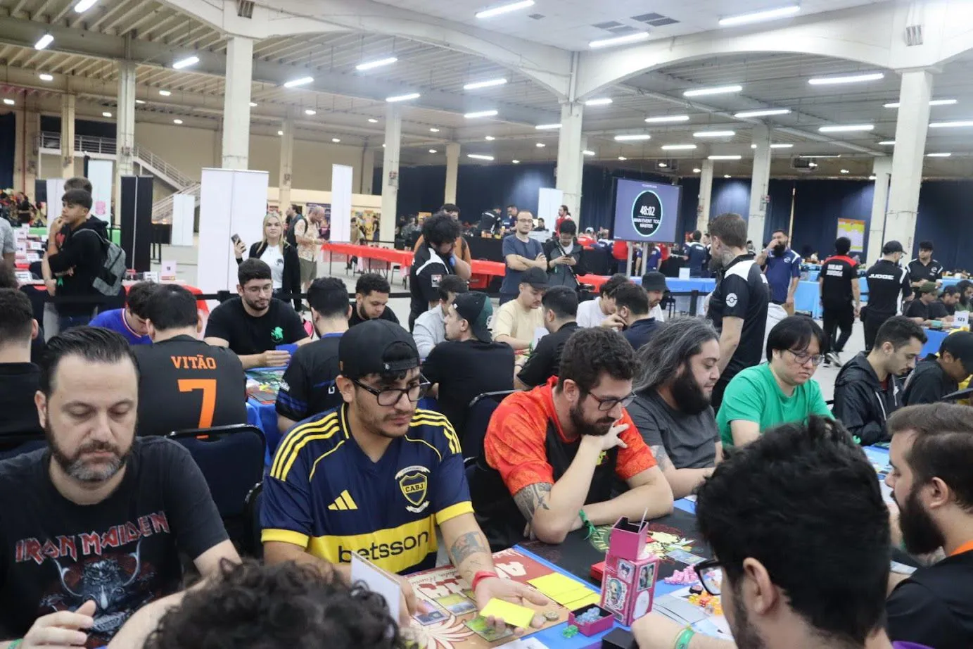 Playing focused in a match at the Curitiba Pokémon TCG Regional