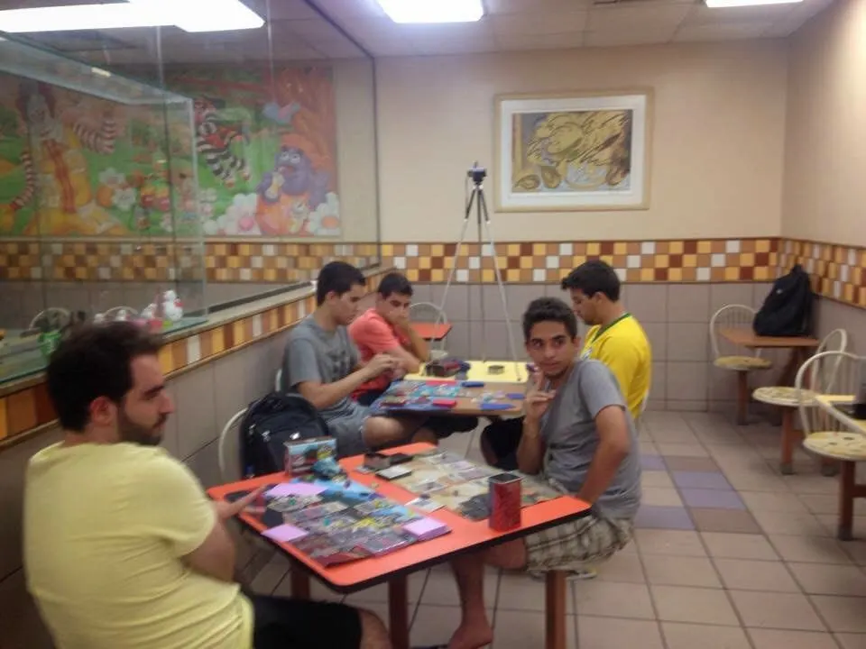TCMG players competing in Pokémon TCG matches at a McDonald’s during the group’s early monthly events.